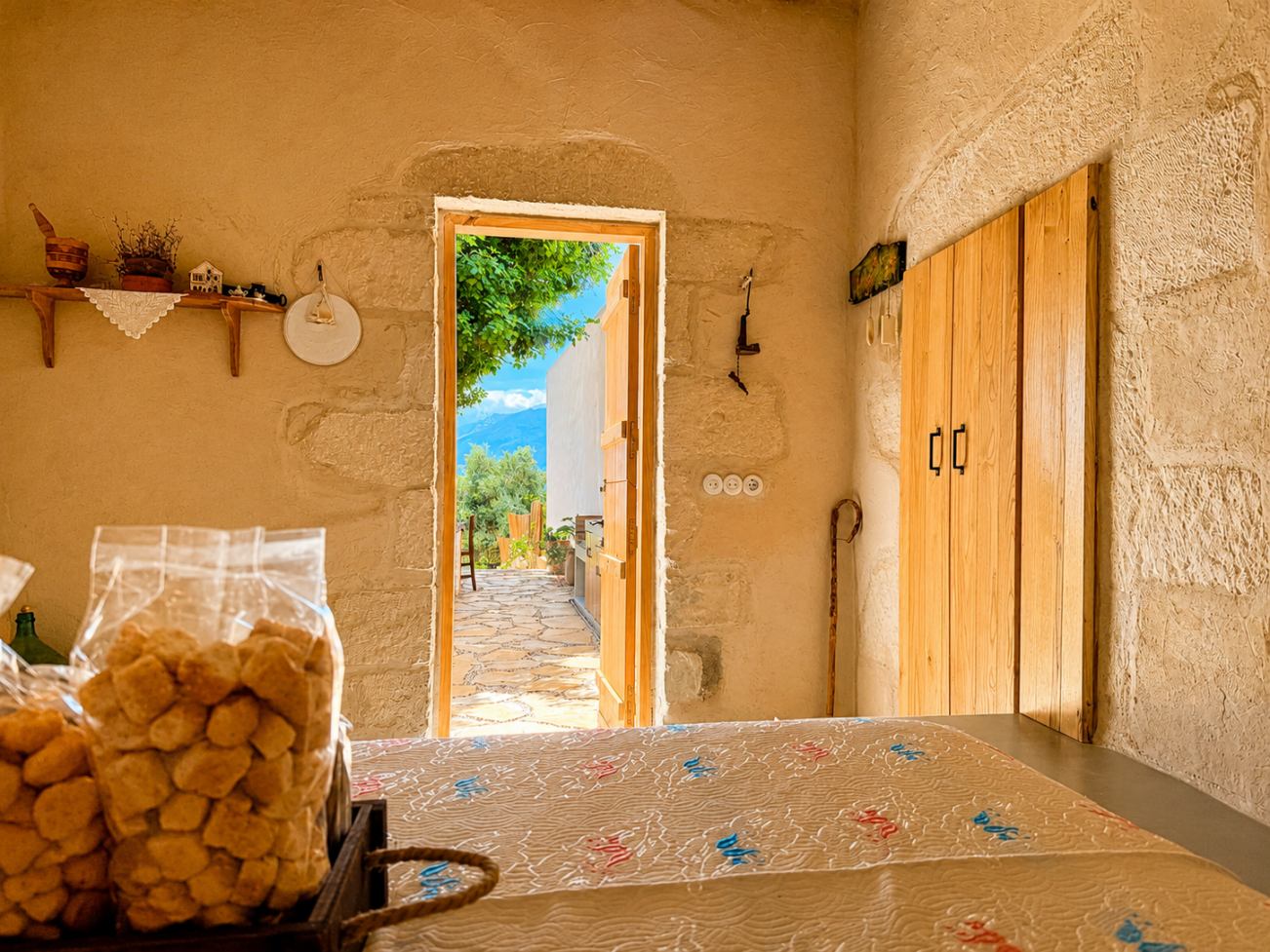 Morning light through the open door of the stone room